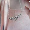 Elegant Hollow Water Wave Pendant Necklace with Spiral Spring Design - Light Luxury Clavicle Chain