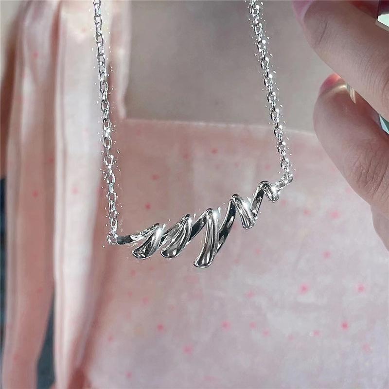 Elegant Hollow Water Wave Pendant Necklace with Spiral Spring Design - Light Luxury Clavicle Chain