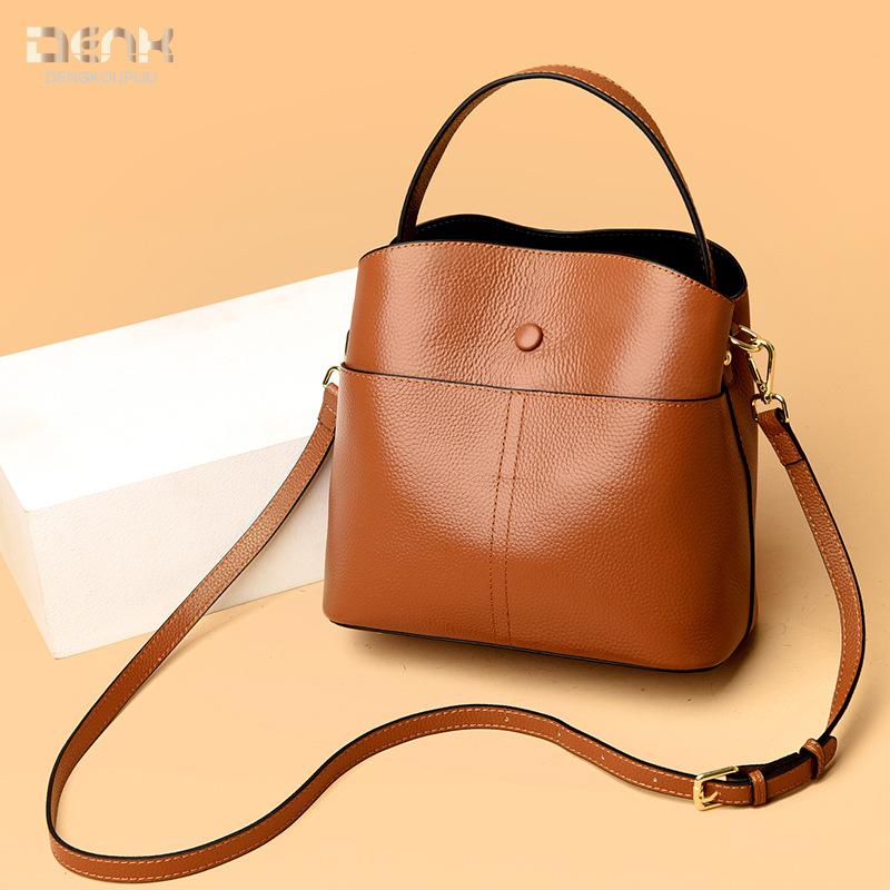 

New leather women s bag simple first layer cowhide hand carry messenger large capacity commuter bag women