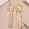 Ethnic Style Tassel Earrings with Hollow Flower Design