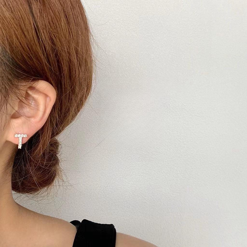 Korean Micro-Diamond Trendy Letter Stud Earrings: Elegant, High-End Accessories for Women's Unique Style.