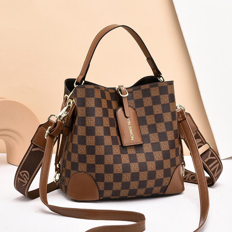 

В этом году популярная сумка-ведро 2025 новая нишевая женская портативная на плечо сумка-мессенджер в иностранном стиле кофейный