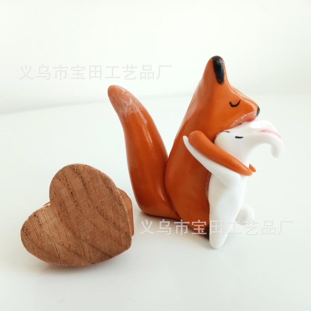 A fox and bunny with love hug home cartoon mini resin figurine ornament