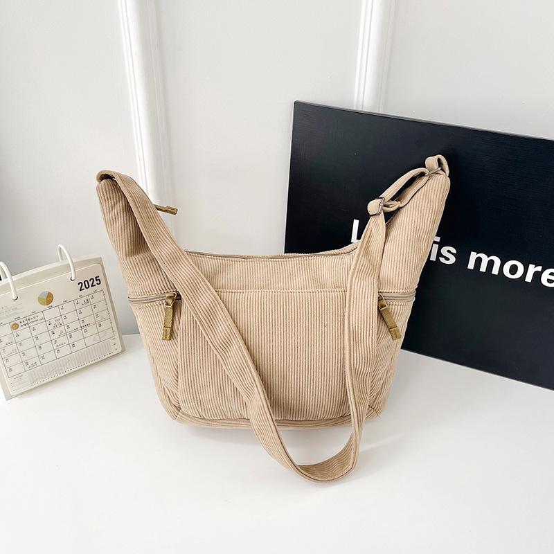 Niche design messenger bag large capacity dumpling bag women's shoulder bag casual women's bag simple sports commuter backpack