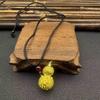 Vietnamesischer Sandgold Buddha Anhänger: Vergoldetes Maitreya Flammen Design