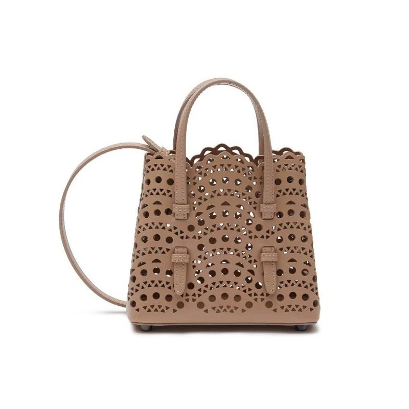 Niche sunflower wave hollow laser engraved cowhide vegetable basket genuine leather women's handbag single shoulder crossbody small bag holder