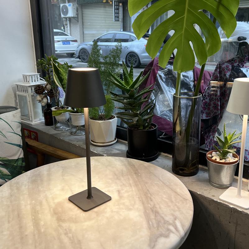 High-Legged Iron Art Black Floor Lamp with Induction Night Light for Dining Table and Bedside Ambience.