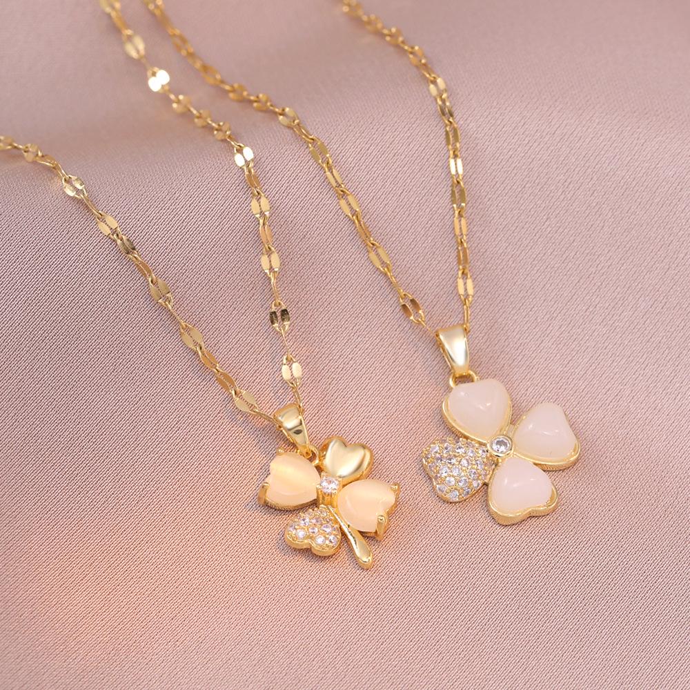 

Women s Titanium Steel Necklace - Four-Leaf Zircon Flower & Cat s Eye Stone Pendant, New Design.