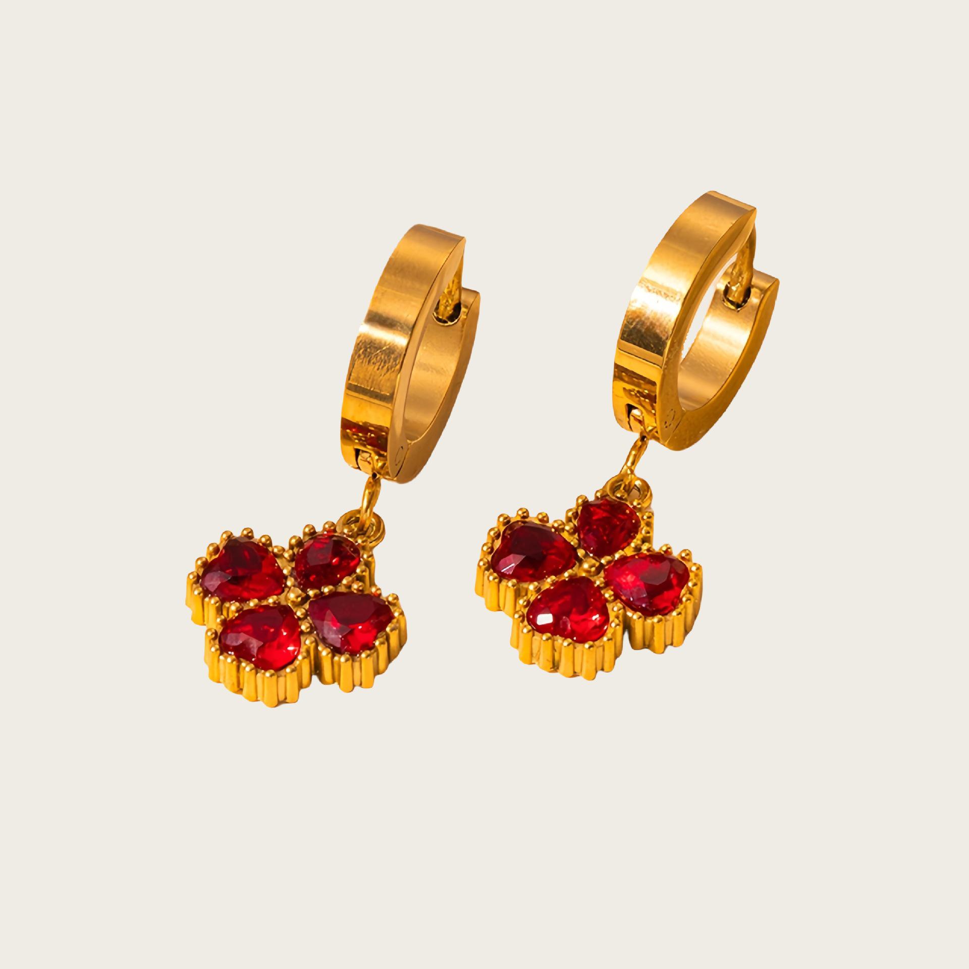 

Элегантные геометрические серьги-пусеты с разноцветными драгоценными камнями из золота 18 карат