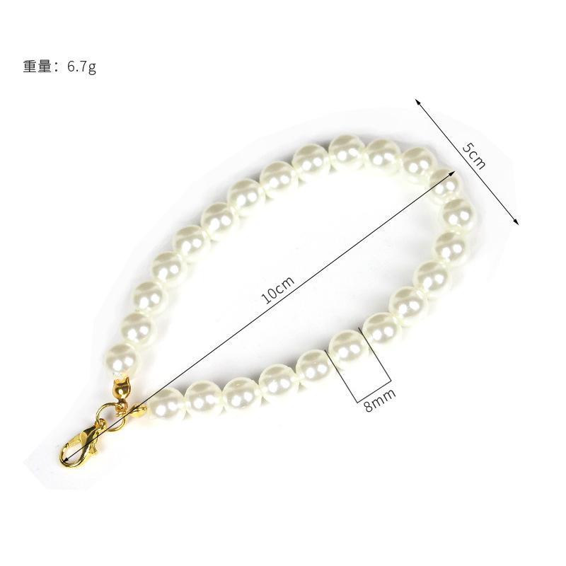 Manufacturer spot supply clothing versatile pearl chain car trailer mobile phone case short URL fashion pendant accessories hairball chain