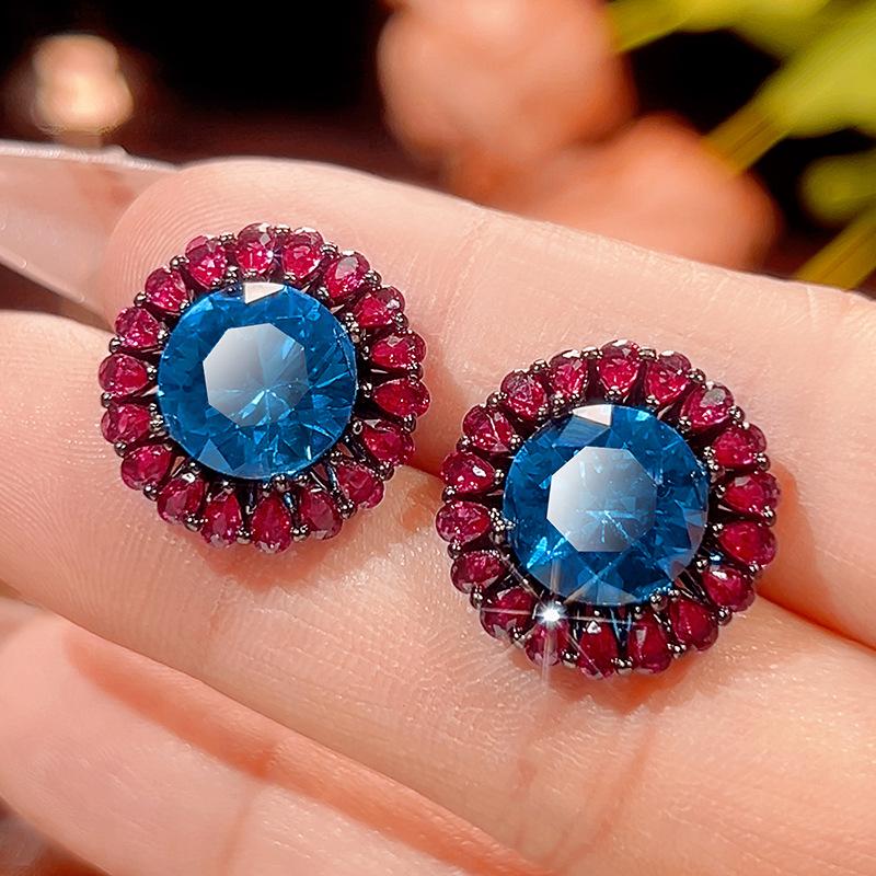 

Autumn and winter new Huabi jewelry copper bottom gold-plated simulation blue spinel advanced sense black gold set main stone 16-10m