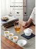 Dehua White Porcelain Travel Kung Fu Tea Set with Bag: 1 Bowl, 4 Cups, Glass Quick Cup, Gift Option, Customizable Logo.