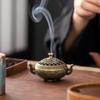 Binaural Antique Incense Burner Exquisite Pattern Hollow Three-legged Burner Indoor Alloy Incense Holders for Yoga Meditation Home Desktop Ornament
