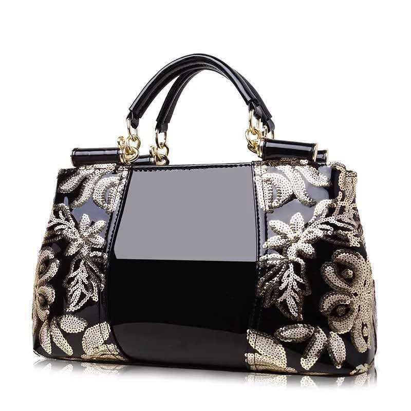Borsa da Donna in Pelle di Lusso con Finiture a Fiore Lucide