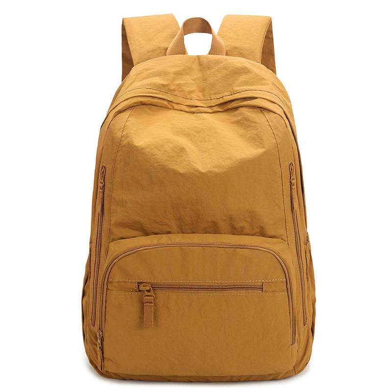 Ryggsäck i enfärgat dam lätt utomhusryggsäck stor kapacitet student skolväska