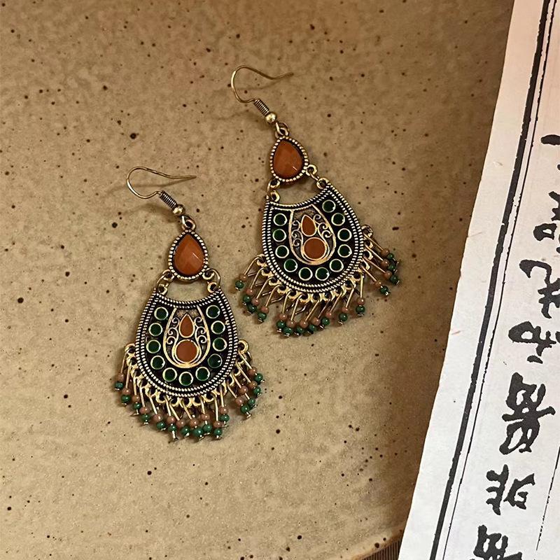 Chinese style dripping oil, water dripping rice beads, fringed ear hooks, retro earrings, personalized creativity, high-end earrings, women