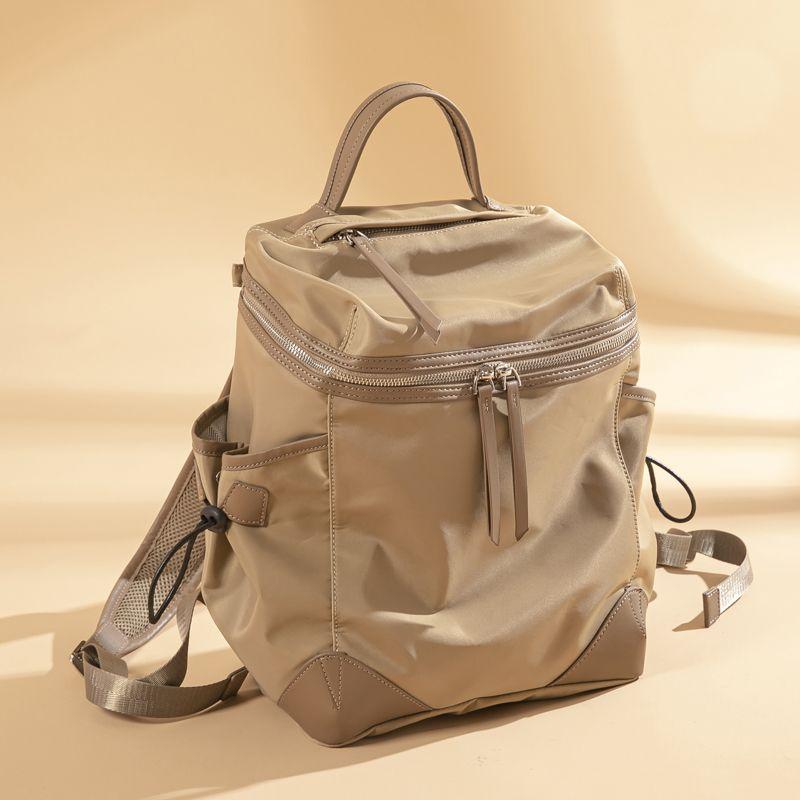 

Niche Cdiwri & Kari New Large Capacity Lightweight Schoolbag Travel Travel Waterproof Backpack Mummy Backpack Khakis