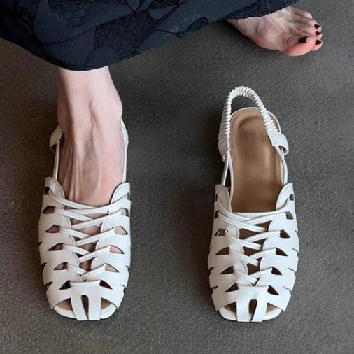 Sheepskin version~ French niche hollow breathable soft leather Roman sandals women's summer back strap flat-bottomed bag head pig cage shoes