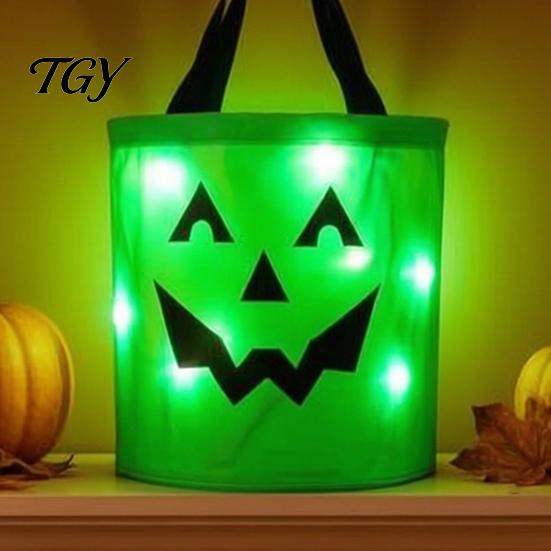 Halloweenowe Torby na Cukierki i Psikusy Świecąca Dynia Torba na Cukierki Wiaderko z Podświetleniem LED Uchwyty dla Maluchów Wielokrotnego Użytku Wodoodporna Torba Tote z Tkaniny Oxford z Uchwytem