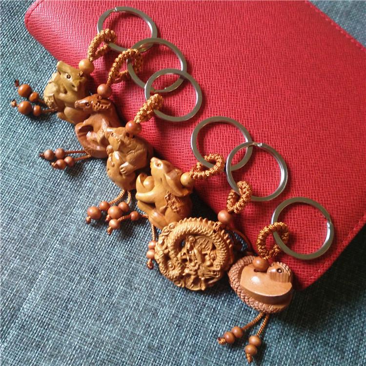 The Twelve Zodiac Keychains, Skillfully Carved from Mahogany, Are Exquisite Three-dimensional Gifts and Popular Sellers At Night Markets.