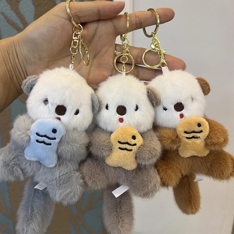 2pcs Fashion Lovely Plush Otters Holding Fish Key Chains Cartoon Cute Otters School Bag Pendant Keyring Funny Toy Student Gifts