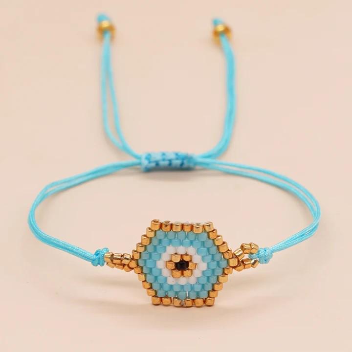 Bracelet en perles d'œil du diable tissé à la main avec motif de niche en verre