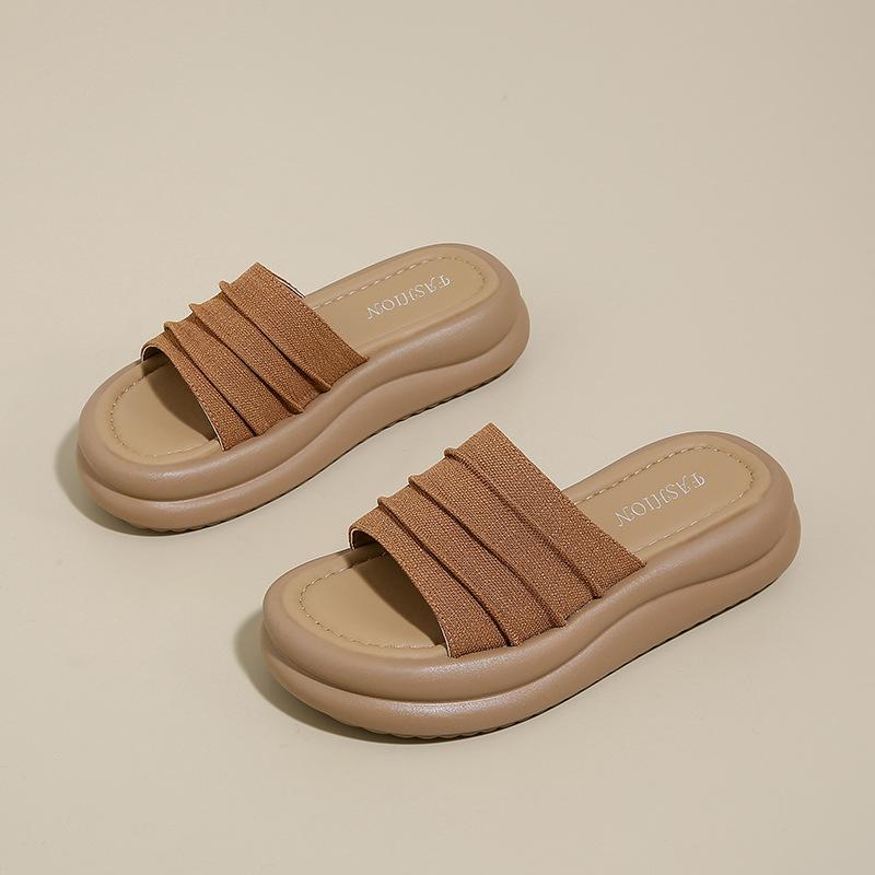 Muffin thick-soled one-word cool slippers outer wear women's shoes 2025 new spring and summer beach casual versatile cool slippers