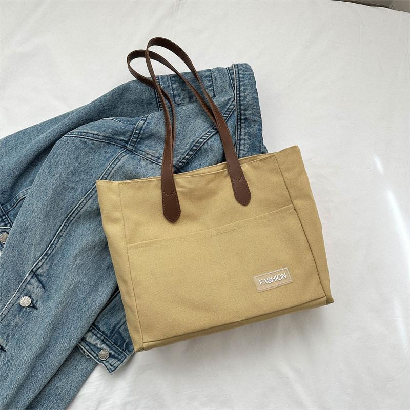 

Stylish Korean Student Tote Bag With Large Capacity Trendy Design For Daily Use In Black White Pink Blue And Khaki хакі
