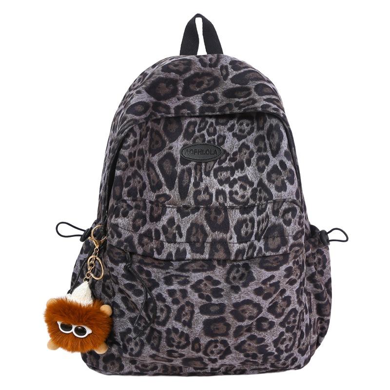 New backpack personalized leopard print versatile portable fashion middle school student schoolbag women's high-end niche backpack
