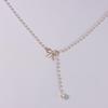 Elegant Bow Pearl Tassel Pendant Necklace – Chic and Versatile Women's Accessory