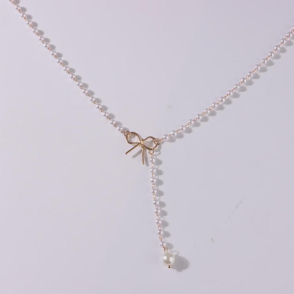 Elegant Bow Pearl Tassel Pendant Necklace – Chic and Versatile Women's Accessory