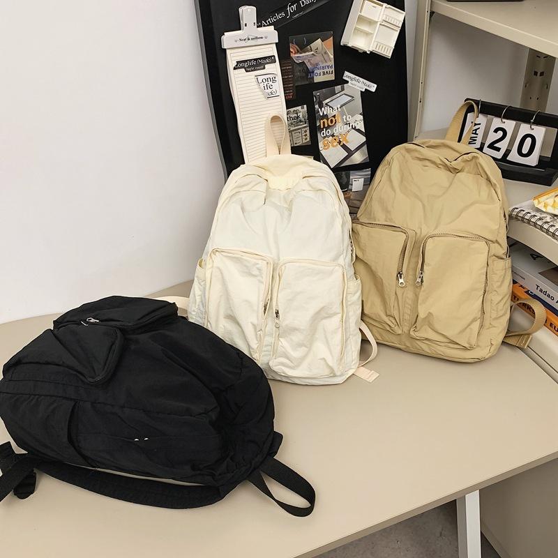 Schoolbag1011 New Lightweight Backpack Men's and Women's Solid Color Simple Travel Student Schoolbag Casual Versatile Commuter Bag