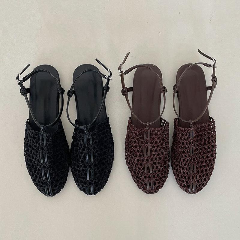 Sheepskin summer new niche woven Roman shoes one-word buckle flat bottom fishing net bag head sandals women wear half slippers