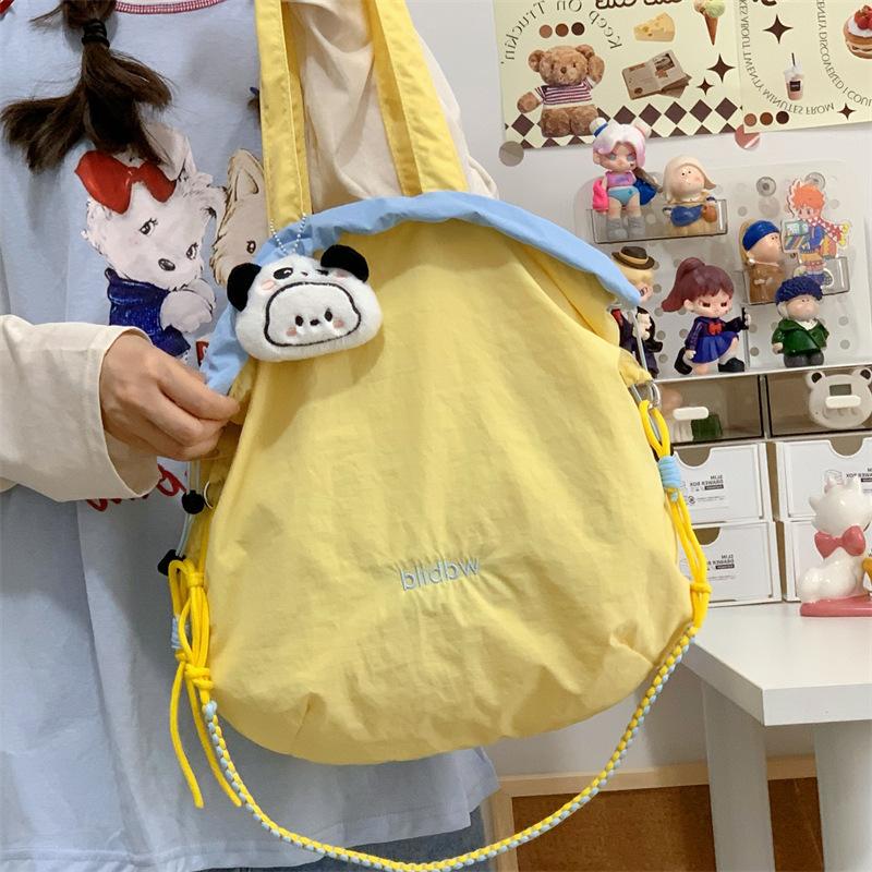 Niche Canvas Bag Color Matching Drawstring Adjustable Shoulder Strap Multi-function Hand Carry Contrasting Color Light Crossbody Shoulder Bag