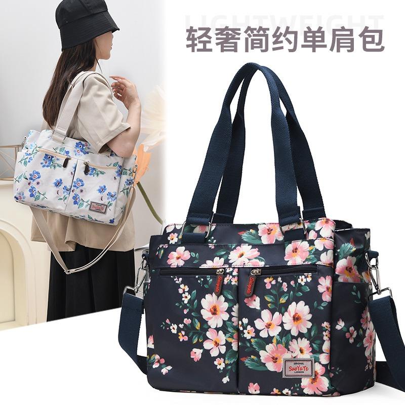 Fashion printing personalized oblique span women's bag simple and elegant shoulder bag large capacity portable go out canvas handbag