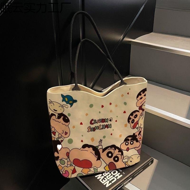 2025 Damen Cartoon Canvas Tragetasche - Schultertasche mit großer Kapazität für Pendler oder Schule