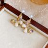 Color rhinestone butterfly pearl stud earrings women's light luxury high-end temperament atmospheric earrings 1011 new niche earrings