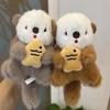 2pcs Fashion Lovely Plush Otters Holding Fish Key Chains Cartoon Cute Otters School Bag Pendant Keyring Funny Toy Student Gifts