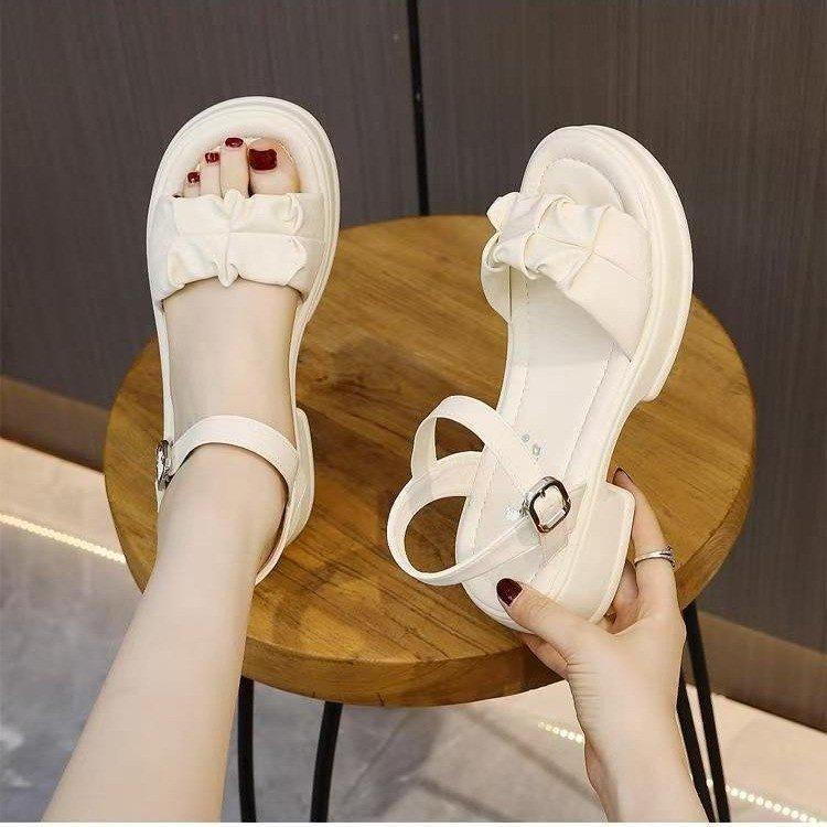 Height-increasing thick-soled muffin-soled sandals for women's summer wear 2025 new fairy style casual versatile thick-heeled beach shoes