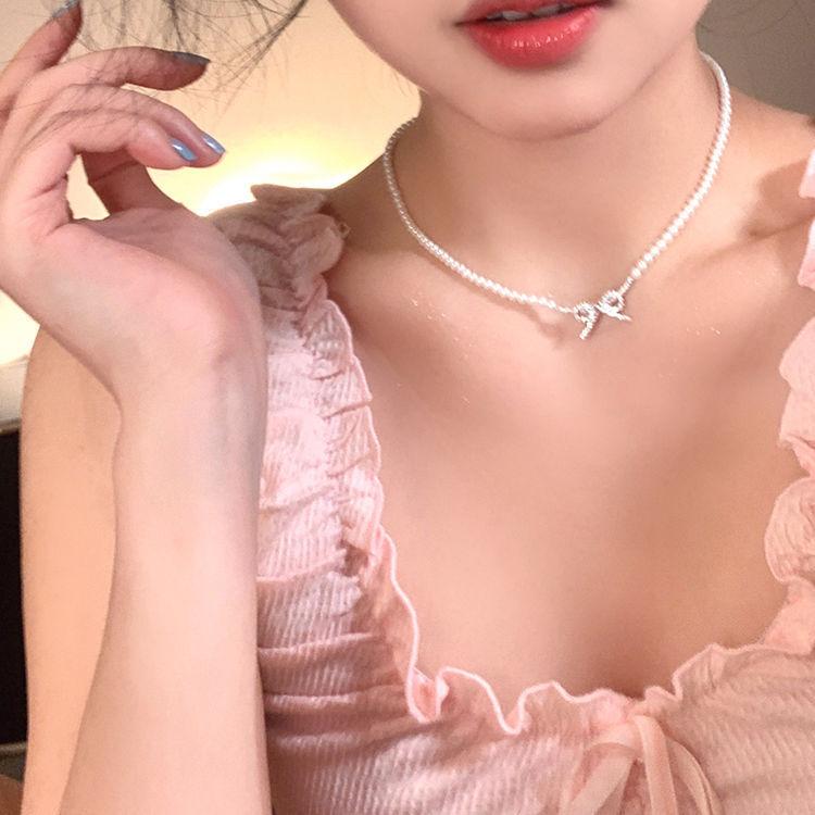 Sweet and fashionable small fragrant style pearl bow pendant necklace light luxury temperament niche design high-end collarbone chain