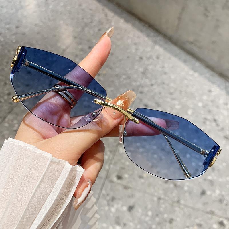 Leopard Head Sunglasses Female Metal Cat Eye Marine Piece Sunshade Sunglasses Curved Glasses