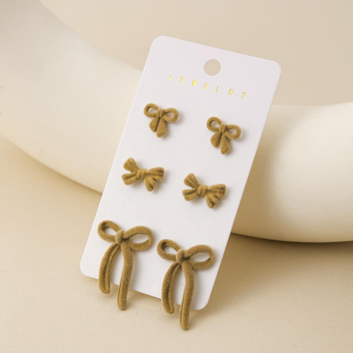 

Hot-selling autumn and winter plush bow stud earrings set, retro niche earrings, versatile earrings.
