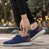 Neue große Größe 48 Sportschuhe trendige Mode vielseitig fliegendes Gewebe Freizeitschuhe trendige atmungsaktive Mesh-Schuhe Herrenschuhe