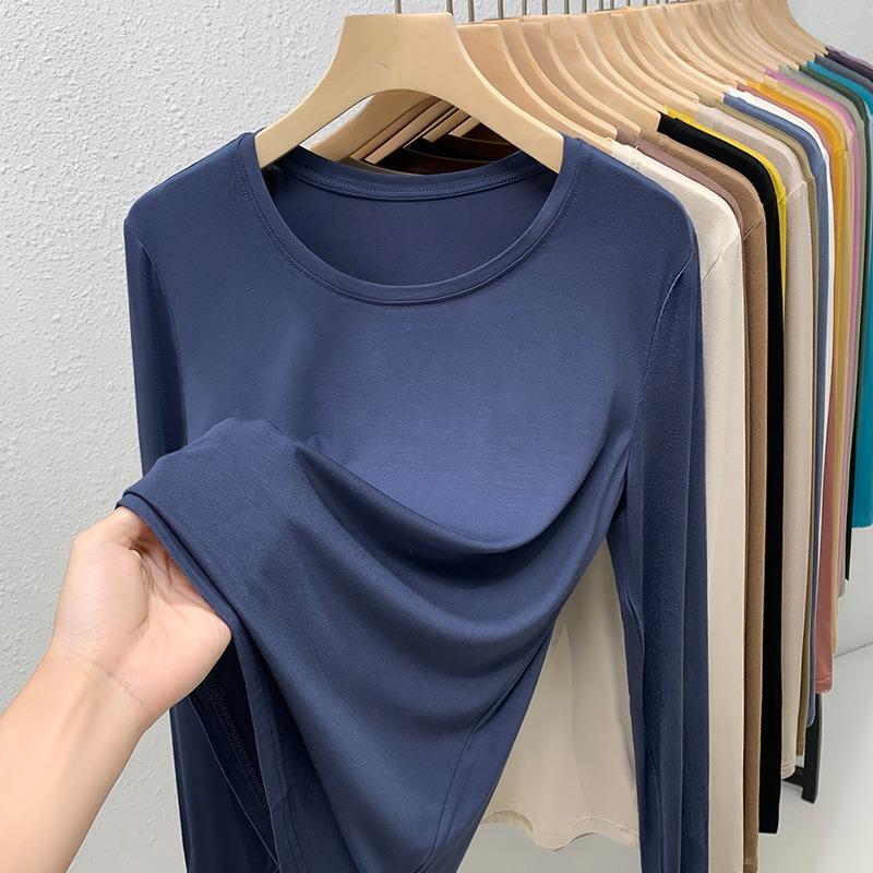 

Thin bottoming shirt women s new women s clothing solid color round neck long-sleeved t-shirt elastic inner waist top 3XL темно-синього кольору