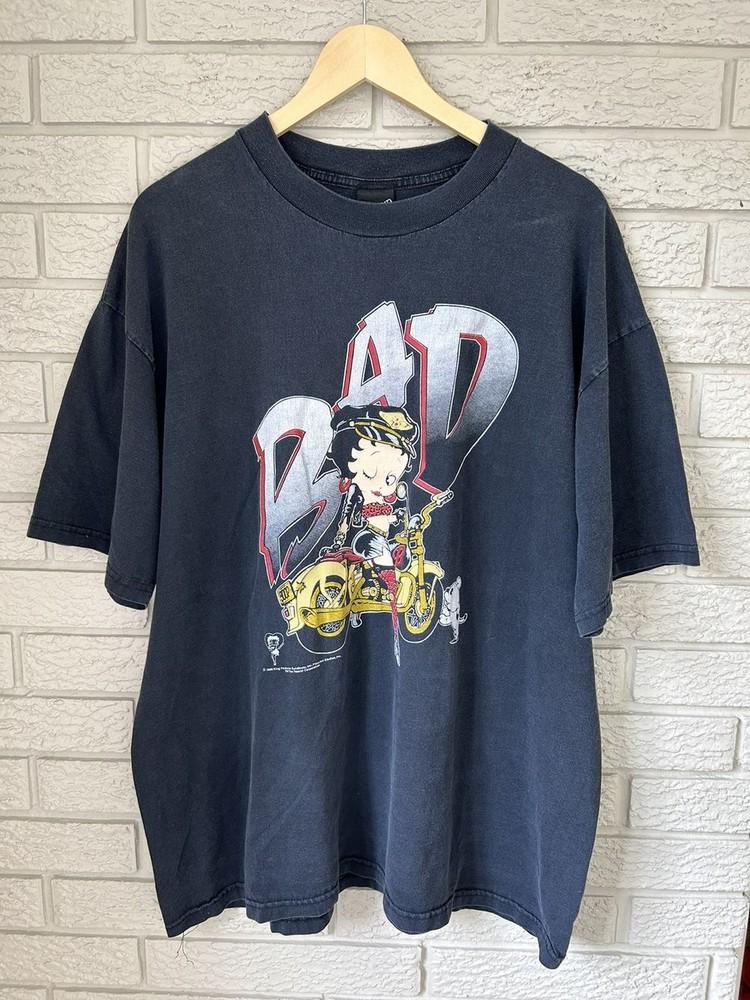

Vintage 90#039s Betty Boop “BAD” Motorcycle Sun Black Unisex Tshirt Reprint KH12816 Unisex T-Shirt XXXL