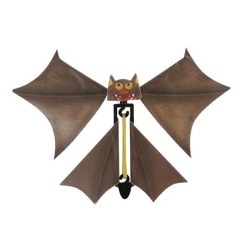 

A Flying Bat Magic Prop, a 1:1 Replica Bat Made of Plastic, Suitable for Tabletop Performances, Street Magic