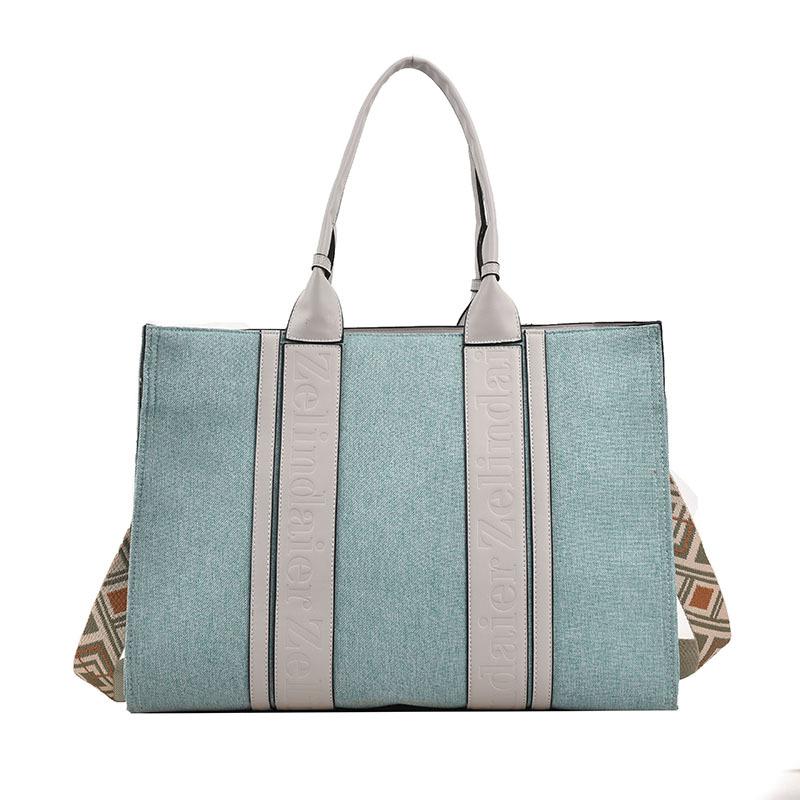 Commuter tote bag new large-capacity handbag women's 2025 broadband high-end sense work fashion messenger bag