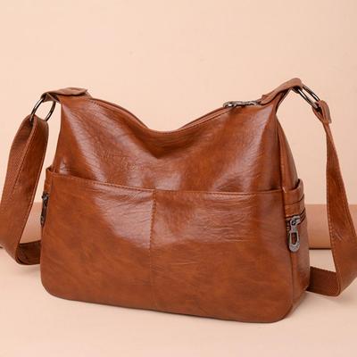 Retro Kvinnor Axelväska Mjukt PU Läder Lyx Designer Kvinnlig Messenger Bag 2022 Trend Stor Kapacitet Handväska Damväskor