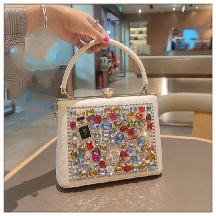Light Luxury New Leather Fashionable Rhinestone Retro Clip Niche Handbag