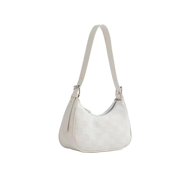 Underarm Bag - Stylish and Sophisticated. An Underarm Bag with A Baguette Shape and A Shoulder Strap.